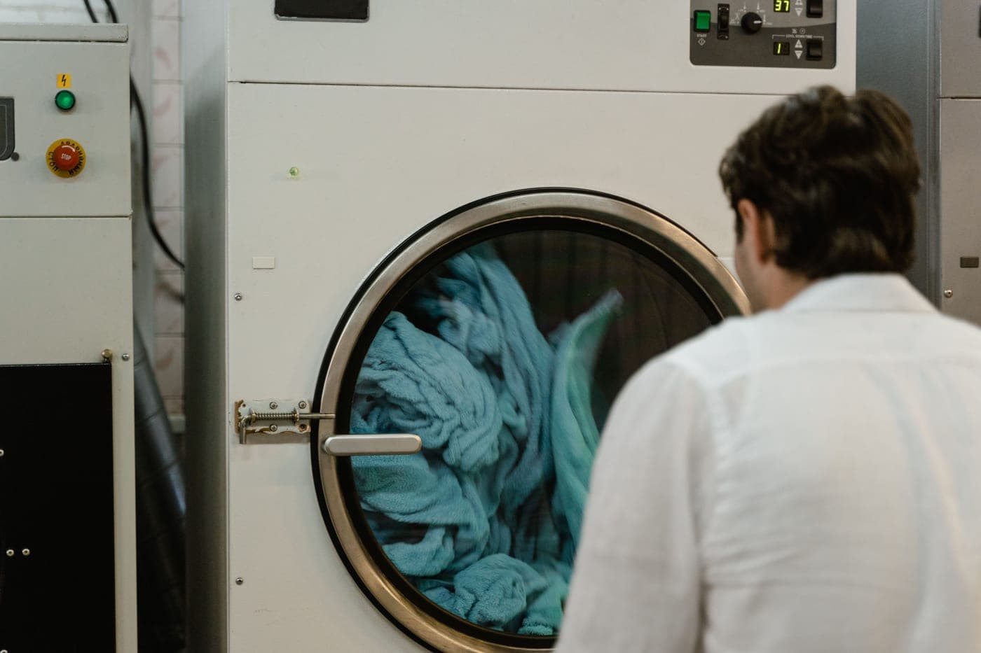 A front-loading washing machine with bedding inside